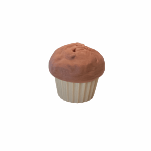 3D printed muffin clicker toy with a light brown top and cream-colored base, designed as a silent fidget that moves smoothly up and down when pressed.