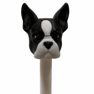 3D-printed Boston Terrier straw topper on a white straw post with black-and-white facial details