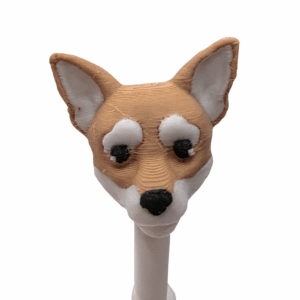 3D printed Corgi straw topper displayed on a white post, featuring tan and white coloring and a cute dog face design.