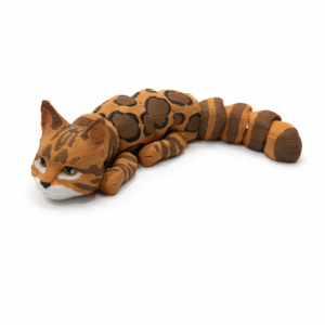 Side view of articulated cat figurine highlighting movable body segments